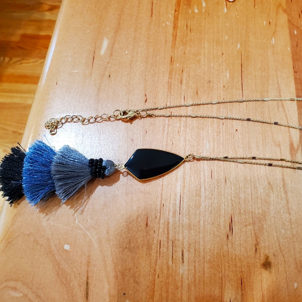 Long necklace with black stone and blue tassels